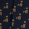 Pattern of dogs on a dark blue fabric background