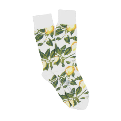 White socks with lemon and leaf pattern on a white background