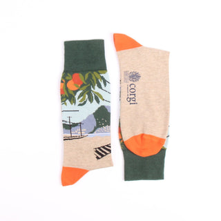 Two socks with different designs on a white background