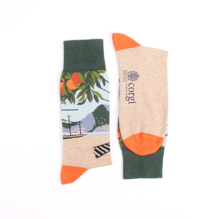 Two socks with different designs on a white background