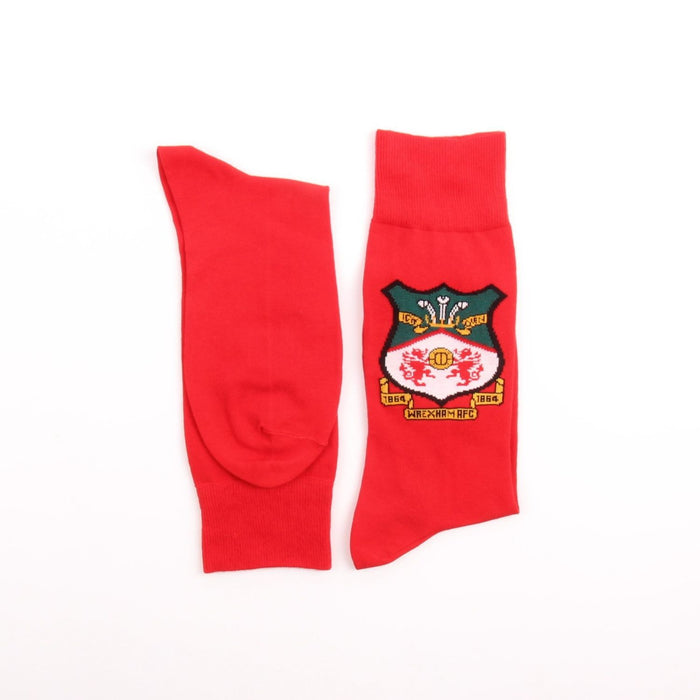 Red socks with a logo on a white background