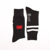Two black socks with a red dragon emblem and white text on a white background