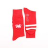 Red socks with white designs on a white background