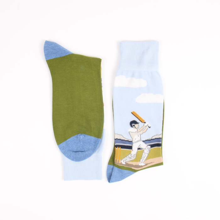 Two socks with different designs on a white background