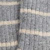 Close-up of pale blue and beige striped fabric texture