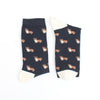 Navy blue socks with corgi dog pattern on a white background