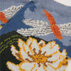 Close-up of a sock with a design of a dragonfly and lilly flower.