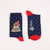 Two socks with festive designs on a white background