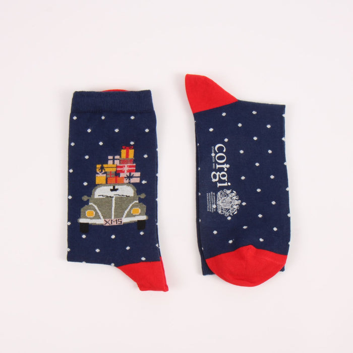 Two socks with festive designs on a white background