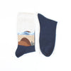 Navy blue sock with beach landscape design on a white background