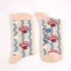 Pair of socks with shell design on a white background