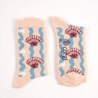 Pair of socks with shell design on a white background