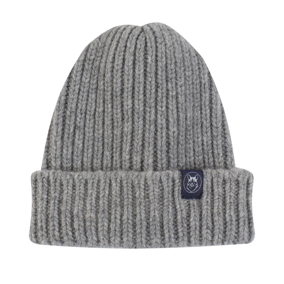 A light gray ribbed knit beanie hat with a folded cuff and a small dark navy brand patch on the side, shown against a plain white background.