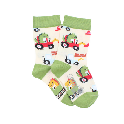 Green and white patterned socks with dinosaur and digger designs