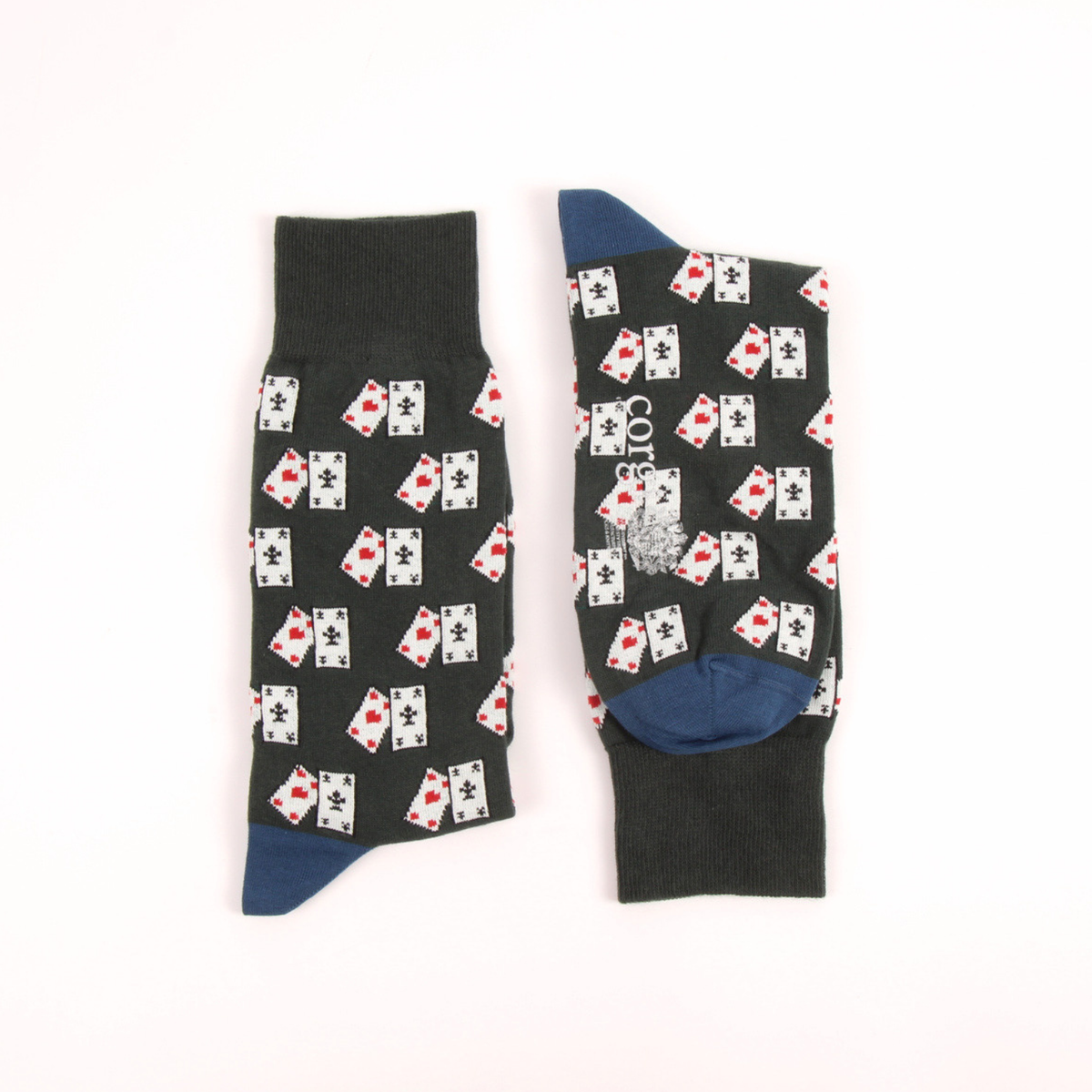 A pair of dark green socks with an all-over playing card pattern, featuring solid blue heels and toes, displayed flat against a white background.