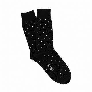 Black socks with white polka dots on a white background