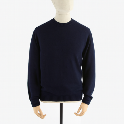 A navy men's classic crew sweater displayed on a mannequin, showing the front view with ribbed neckline, cuffs, and hem.