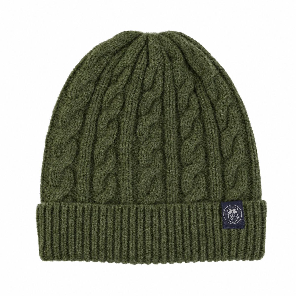 An olive green cable-knit beanie with a folded ribbed cuff and a small dark navy brand patch on the side, shown against a plain white background.