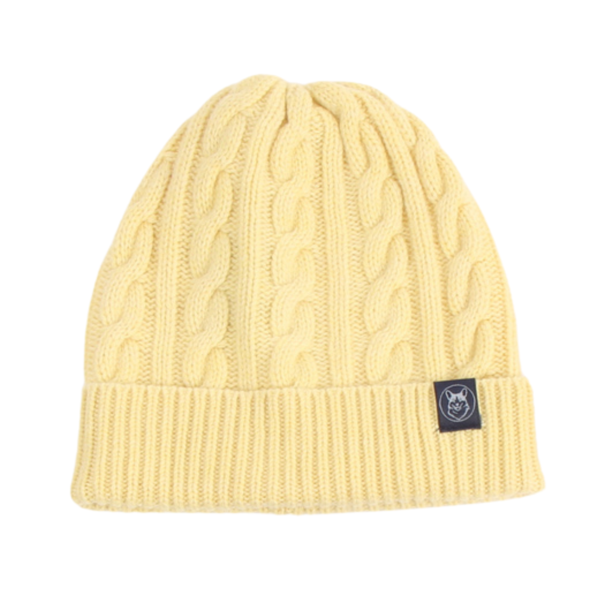 A pale yellow cable-knit beanie hat with a ribbed cuff and a small black brand patch on the side, shown against a plain white background.