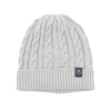 White knit beanie with a brand label on a white background