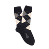 Navy argyle patterned sock on a white background