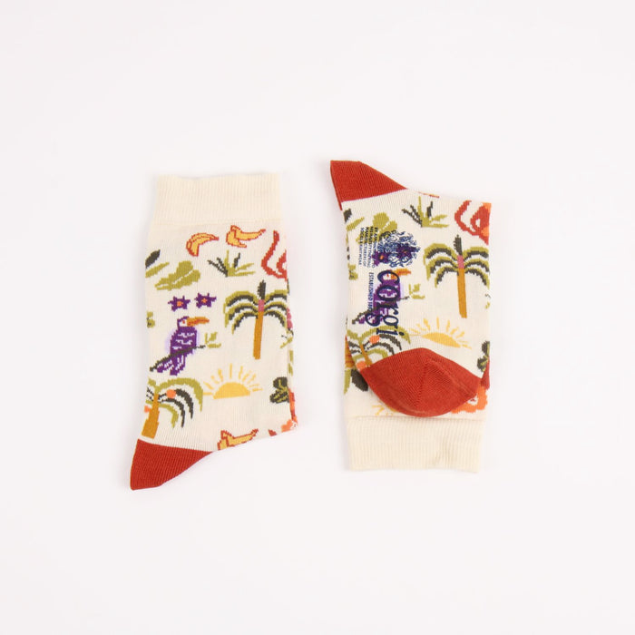 Colourful socks with tropical designs on a white background