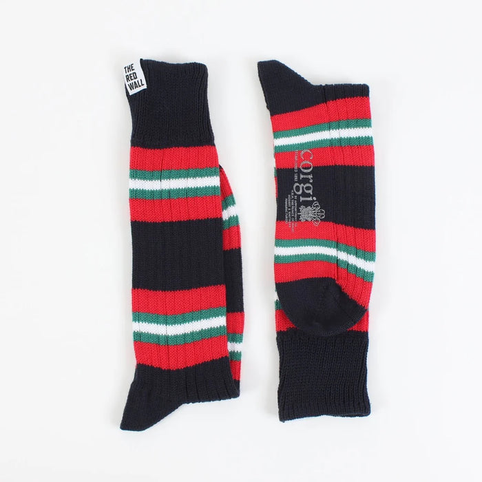 Pair of socks with red, green, and navy stripes on a white background