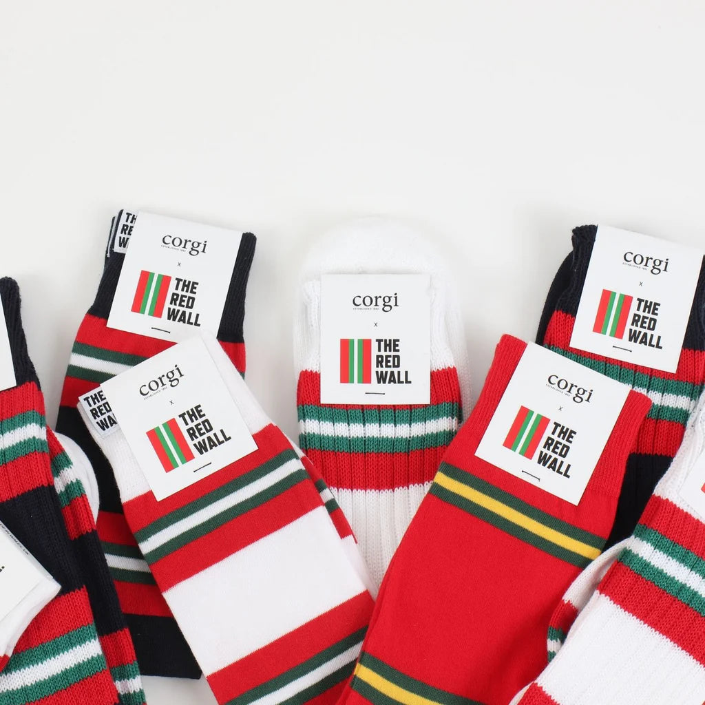 Collection of Red Wall socks laid flat on a white background.