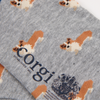 Gray sock with corgi pattern and 'corgi' text on a white background
