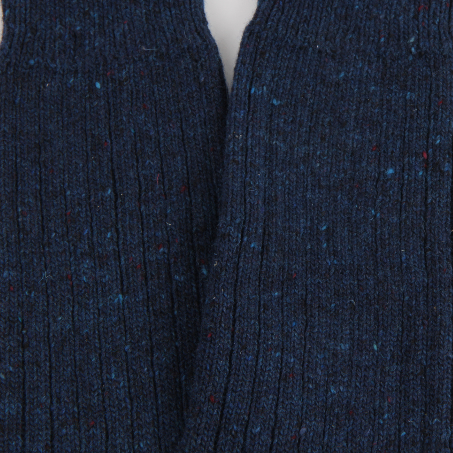 Close-up of a dark blue textured fabric