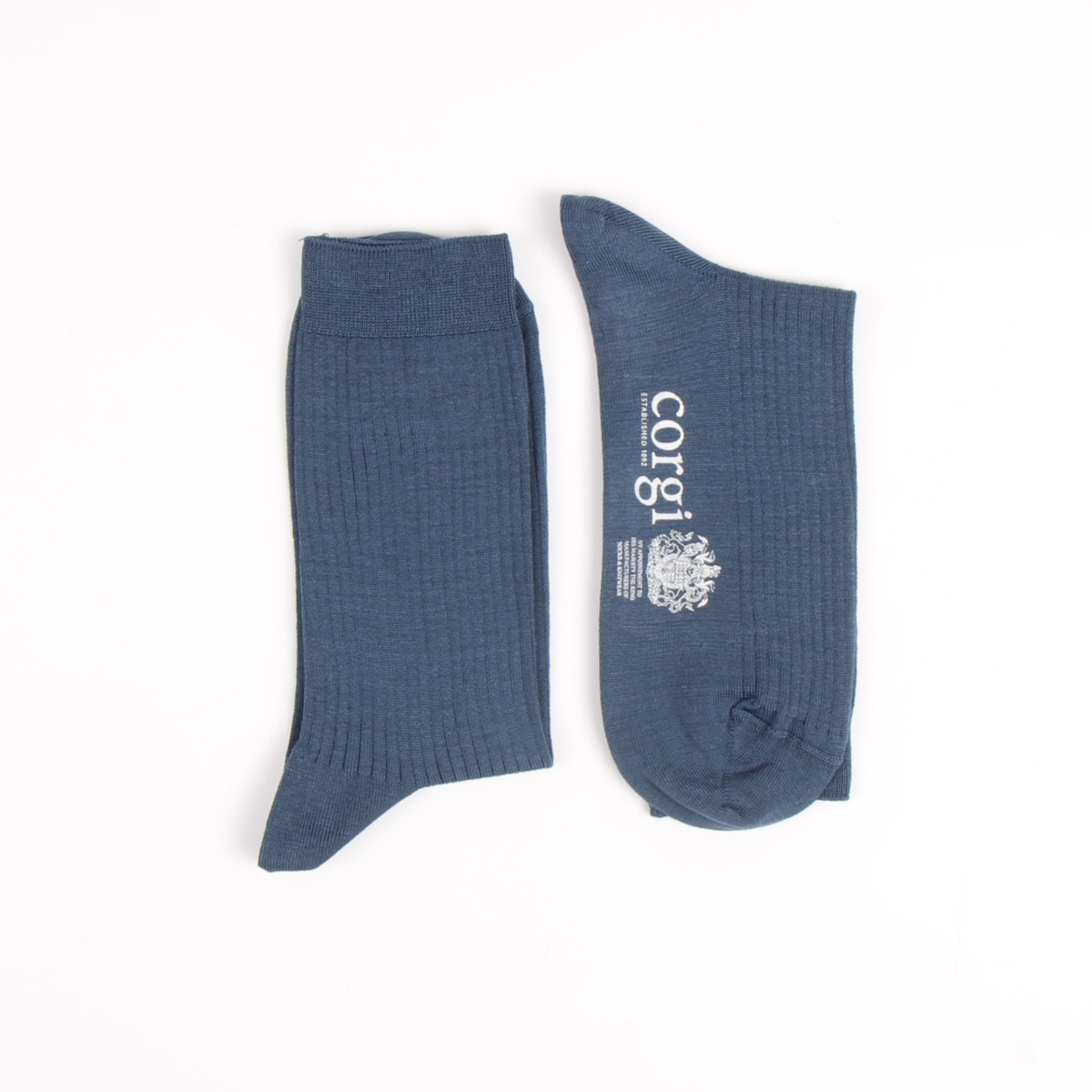 Blue socks with 'Corgi' branding on a white background