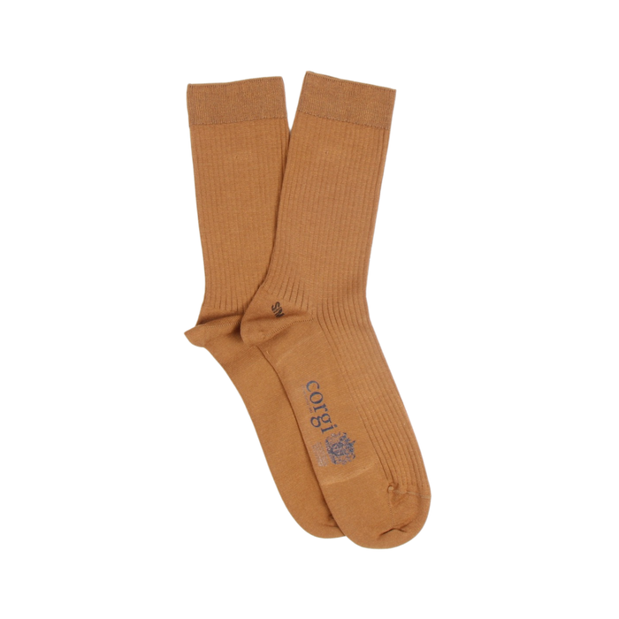 Pair of gold socks with a brand logo on a white background