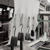 Textile production process with fabric and machinery in a factory setting