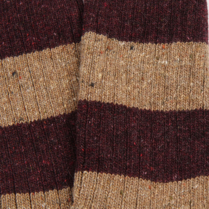 Close-up of a striped fabric with brown and beige colors.