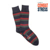 Striped socks with red and green on a white background, featuring 'Combat Stress' text.