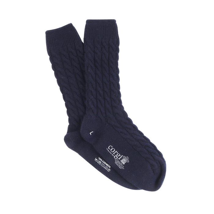A pair of blue cashmere socks with a cable knit pattern, displayed against a white background.