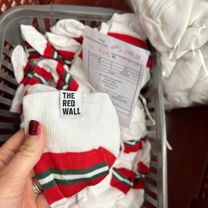 Red Wall Socks being made in the factory.