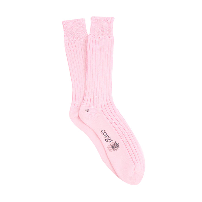 Pink sock with a brand logo on a white background