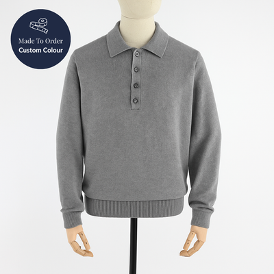 Gray sweater on a mannequin with 'Made to Order Custom Colour' label.