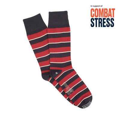 Red and navy striped socks on a white background with 'Combat Stress' text.