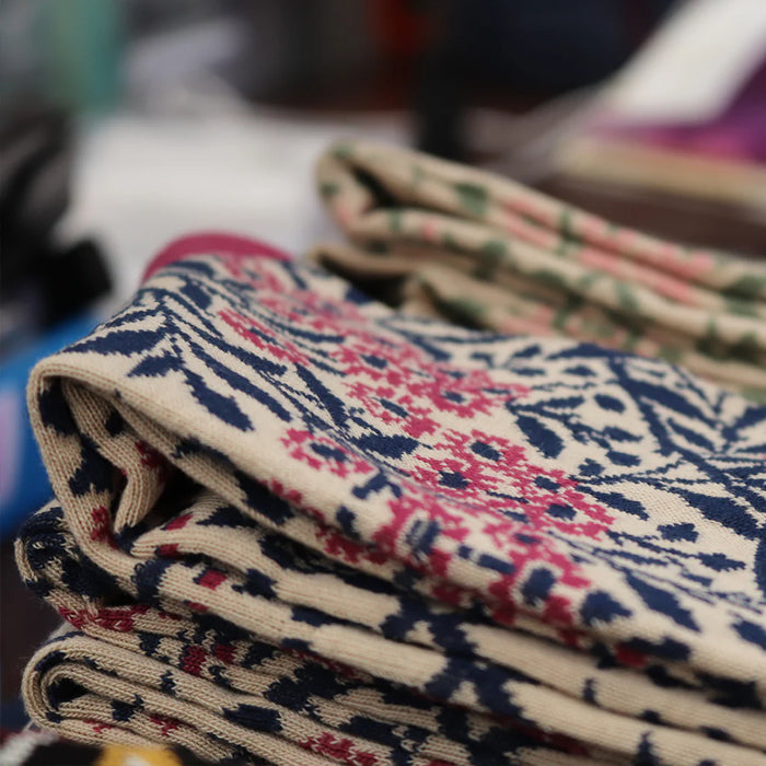stack of socks folded on a table