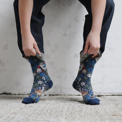 person wearing William Morris socks